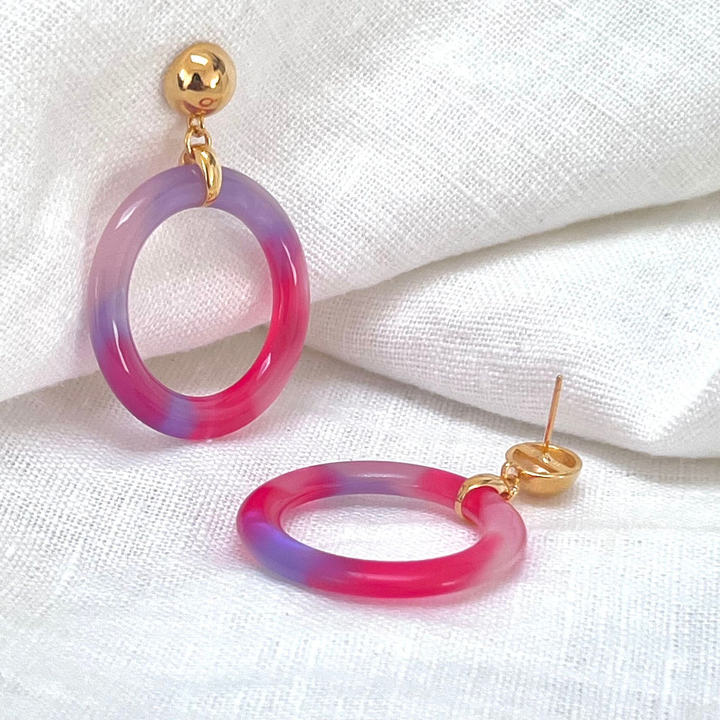 pink tortoiseshell earrings form the Audrey collection on a white linen cloth. Earrings by Misia Mae