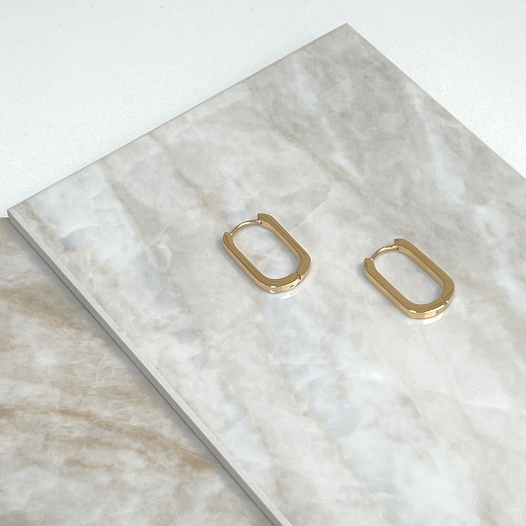 Gold rectangle earrings by Misia Mae