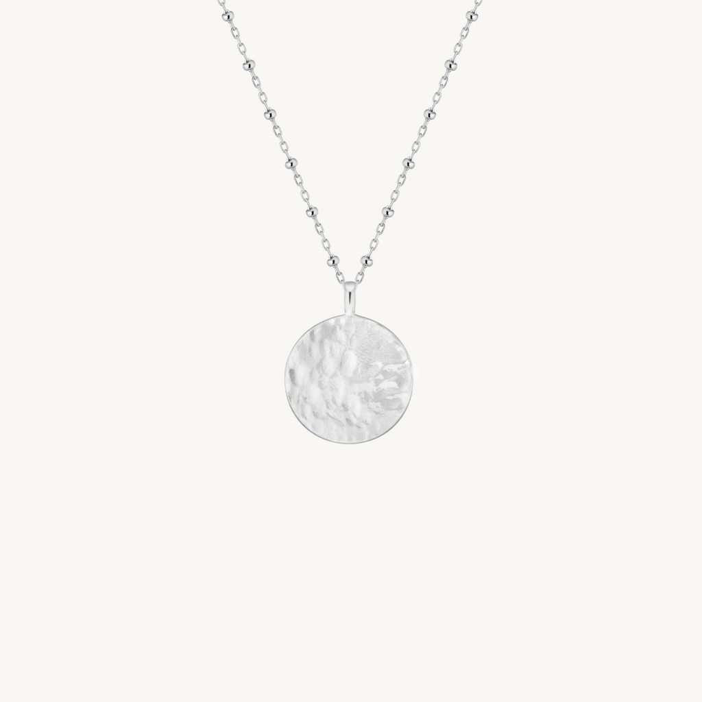 silver hammered round pendant necklace by Misia Mae